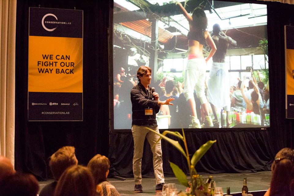 Gilad delivers his SPARK talk on stage at the Conservation Lab 2016